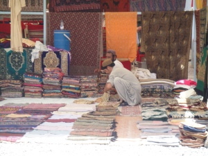 bazaar stalls - rugs, pashminas